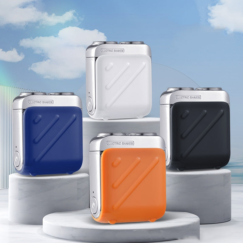 Portable mini electric shavers in various colors on stand