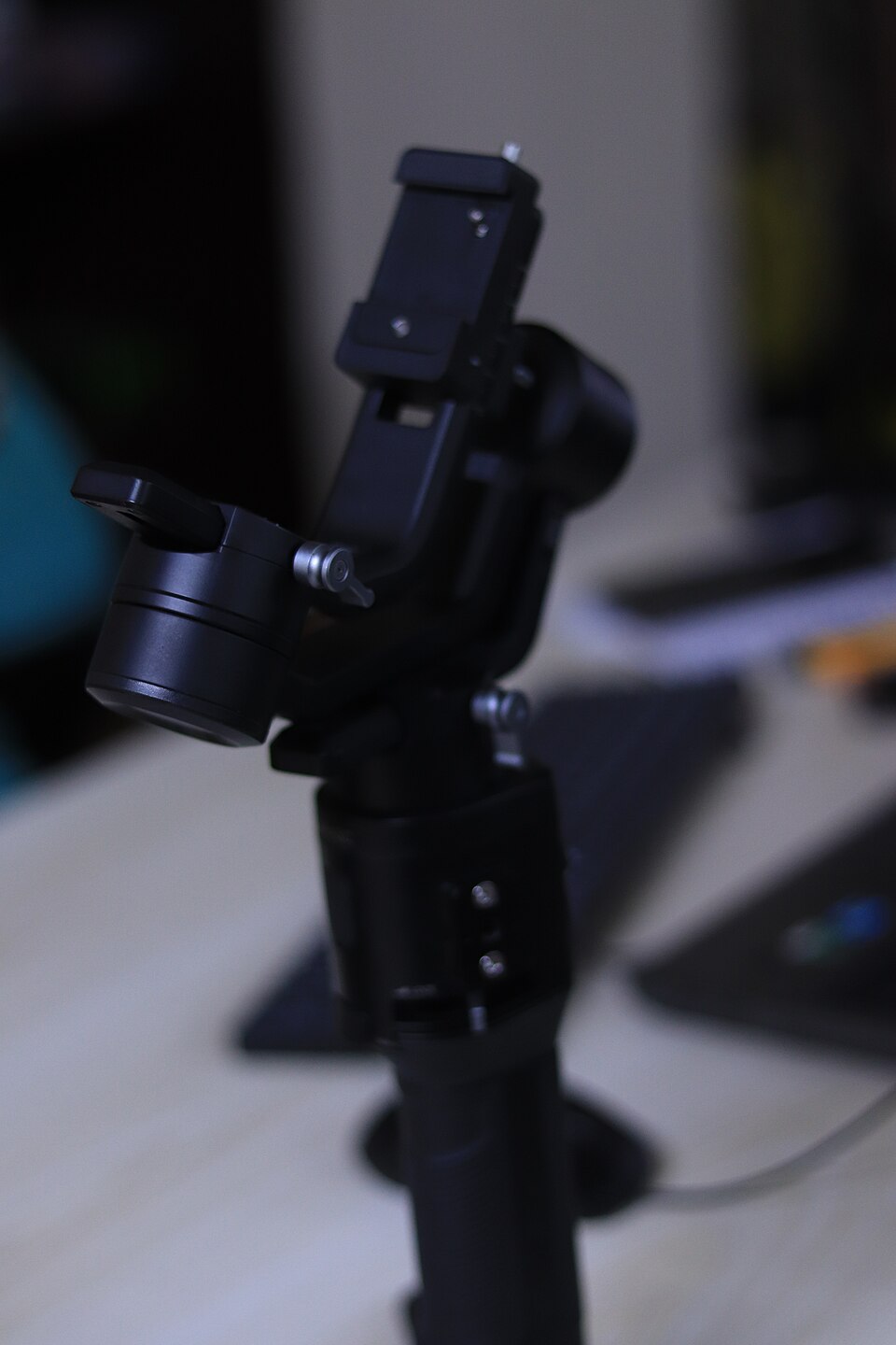 Black camera gimbal on a blurred background